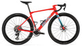 Red bicycle with black tires on a white background