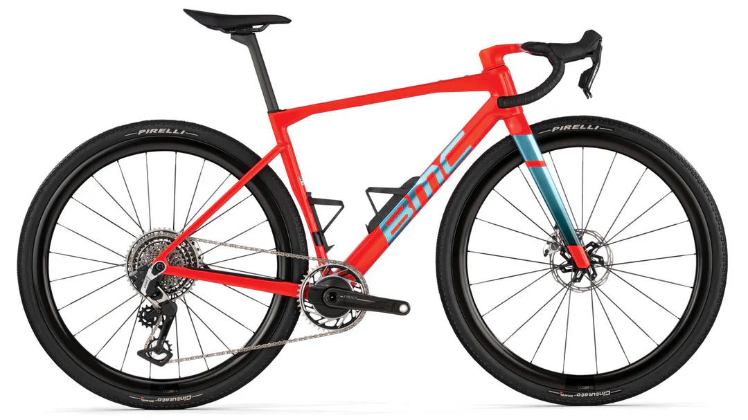 Red bicycle with black tires on a white background