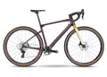 Bicycle with a maroon frame and black components on a white background